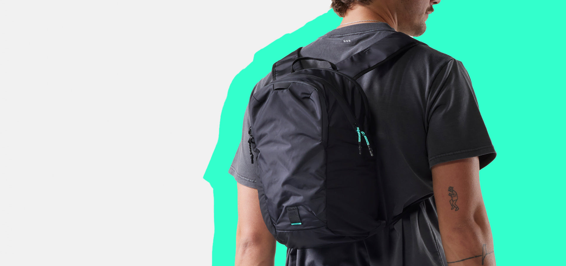 man wearing a black backpack