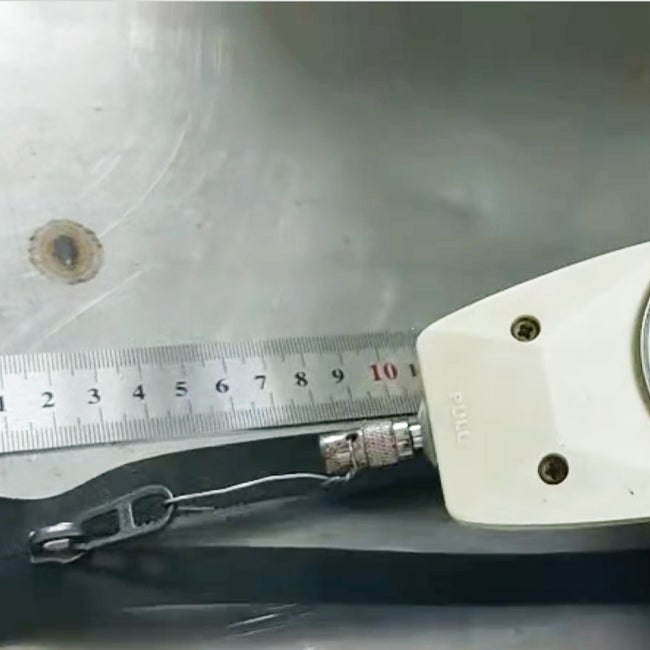 machine testing zipper pull