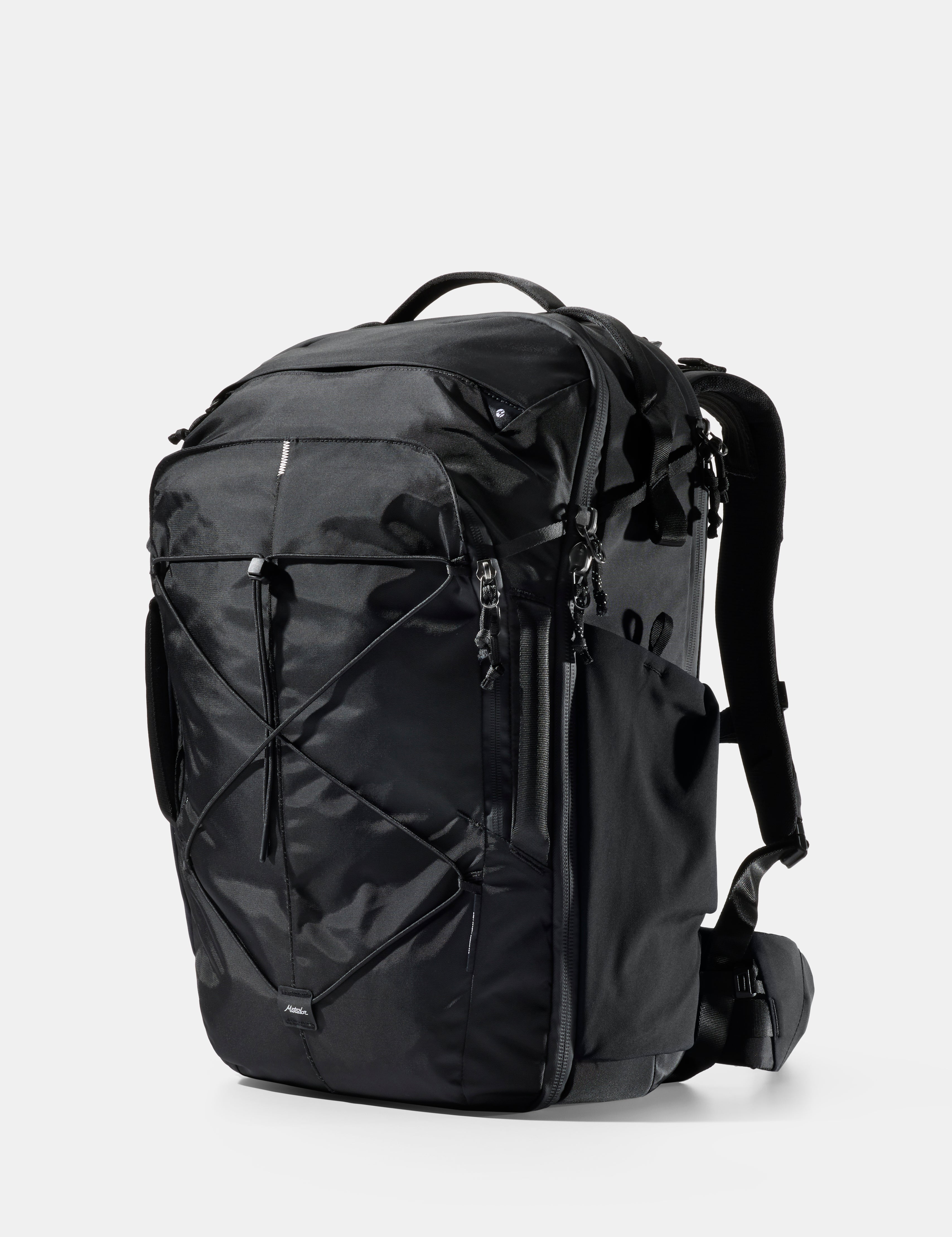 Black backpack on a light gray background