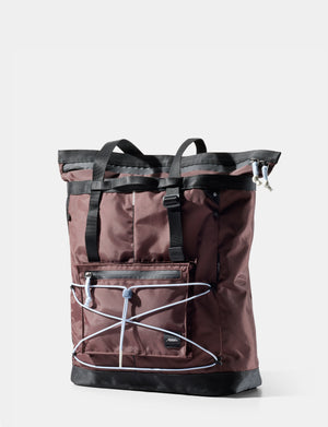 garnet tote with black accents on a white background