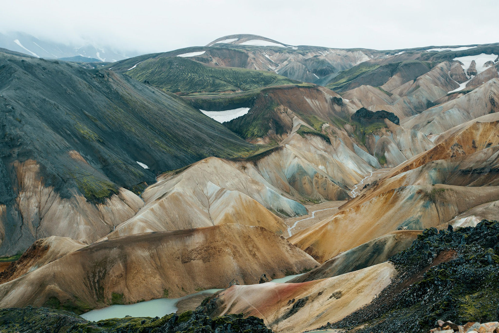 mountains with water running through