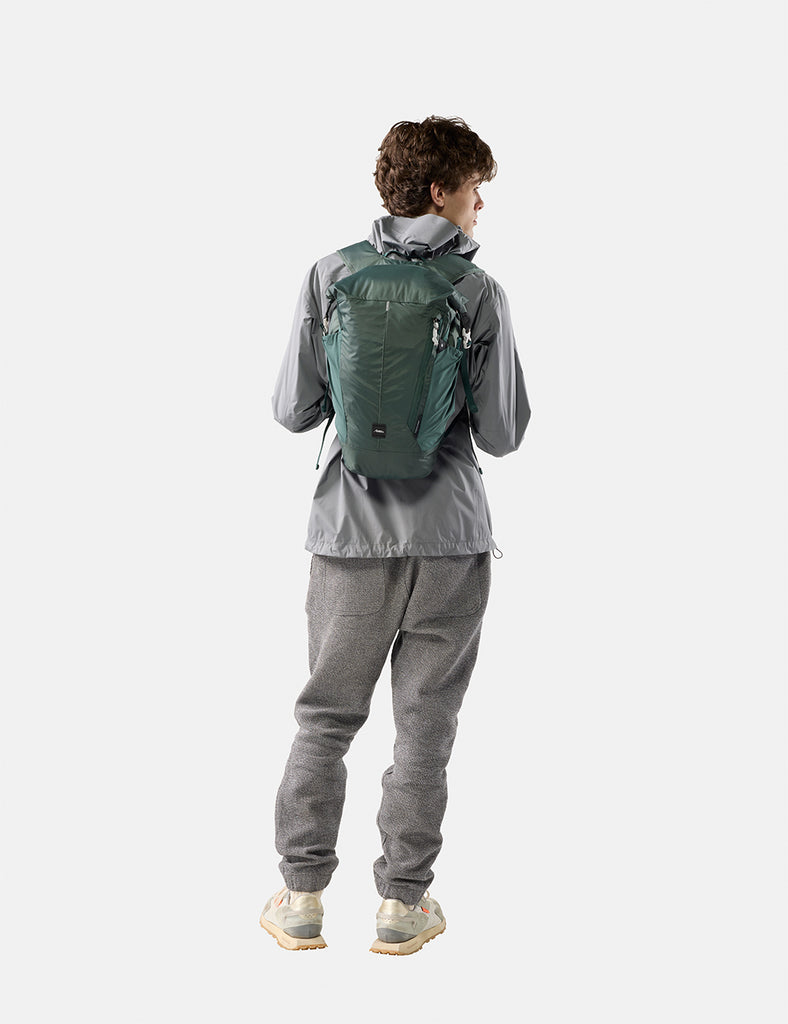 video of man in grey jacket wearing juniper backpack